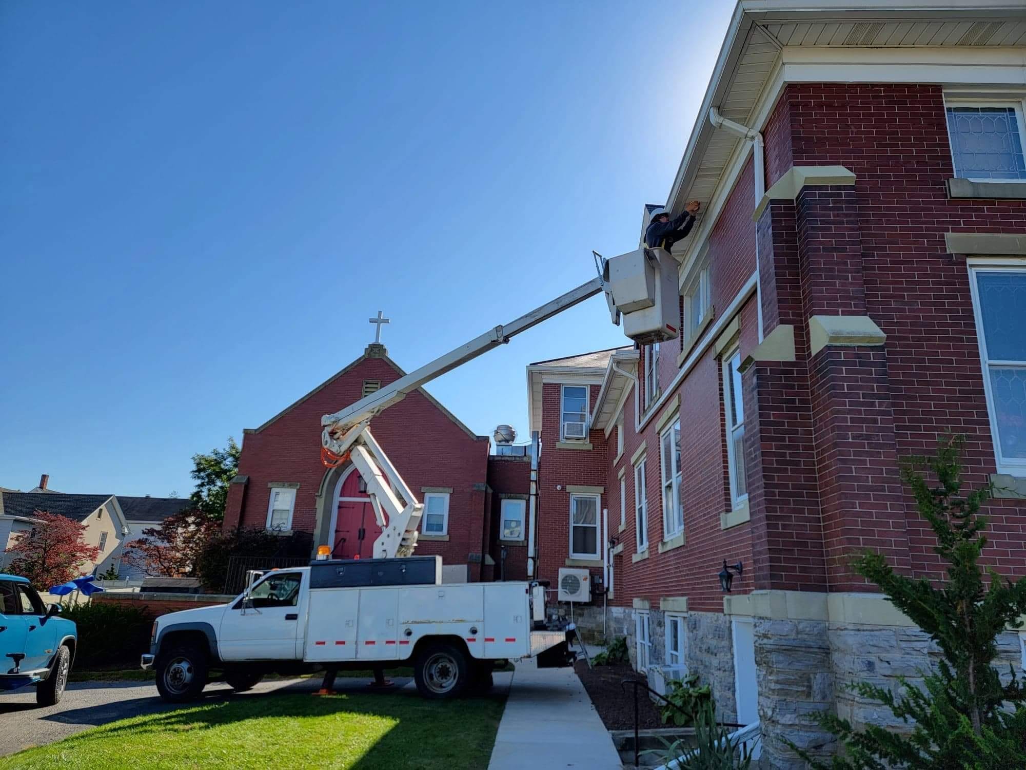 CermakTech bucket truck installing cameras at a church in Waynesboro