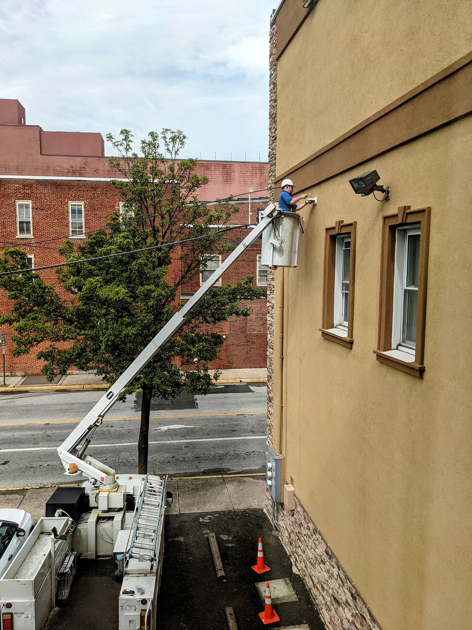 CermakTech bucket truck installing cameras at an office in Shippensburg